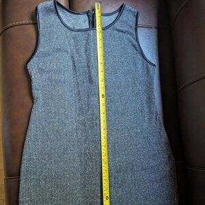 Together Dress very Nice (I believe the Size is M). Acrylic material with zipper